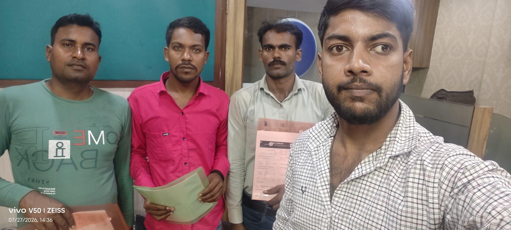 Our recruitment team reviewing candidate paperwork